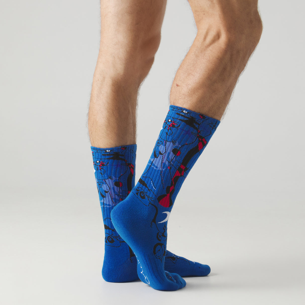 Athletic Miro Figures At Night